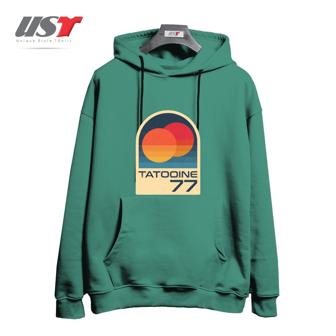 طرح ICONIC PLANET WITH DOUBLE SUN هودی اورسایزرنگ سبز سدری