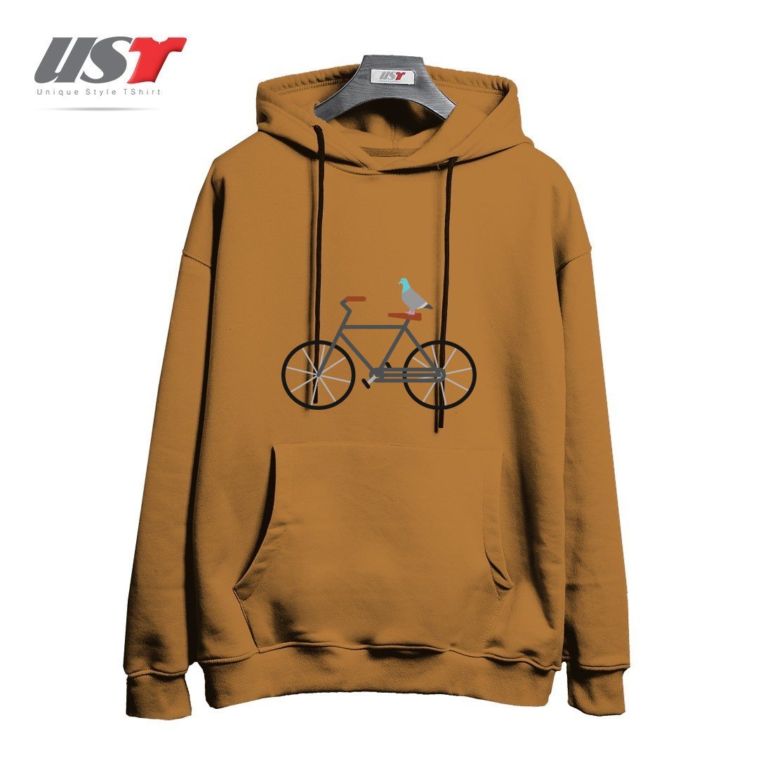 طرح PIGEON RIDING BIKE هودی اورسایزرنگ نسکافه ای