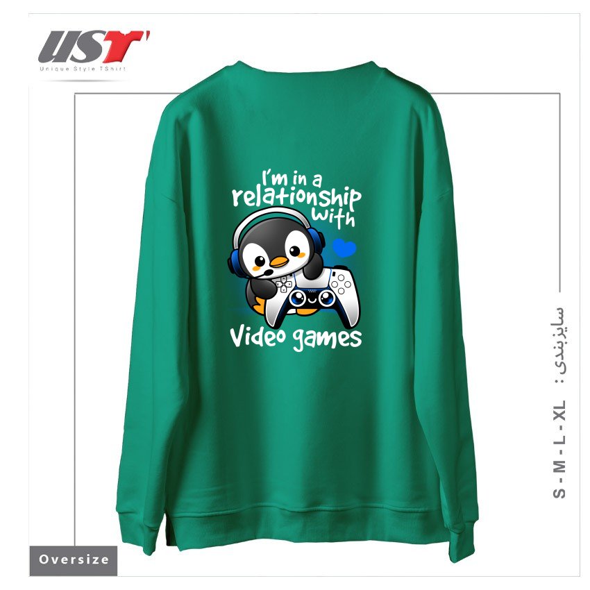 طرح PENGUIN RELATIONSHIP WITH VIDEO GAMES سوییشرت اورسایزرنگ سبز سدری