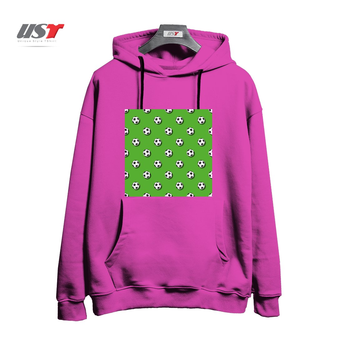 طرح WHITE CLASSIC BALL FOR SOCCER (FOOTBALL) PATTERN ON A GREEN BACKGROUND2 هودی اورسایزرنگ صورتی