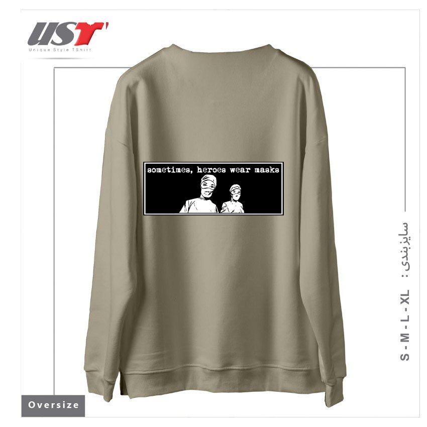 طرح SOMETIMES HEROES WEAR MASKS سوییشرت اورسایزرنگ نخودی