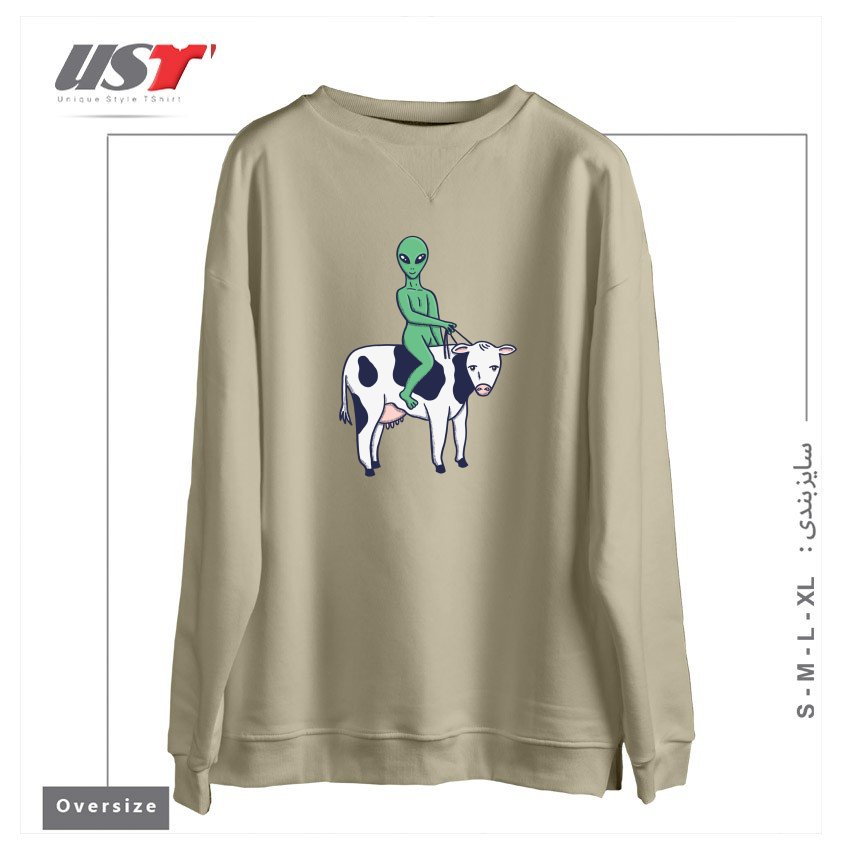 طرح ALIEN RIDING A COW سوییشرت اورسایزرنگ نخودی