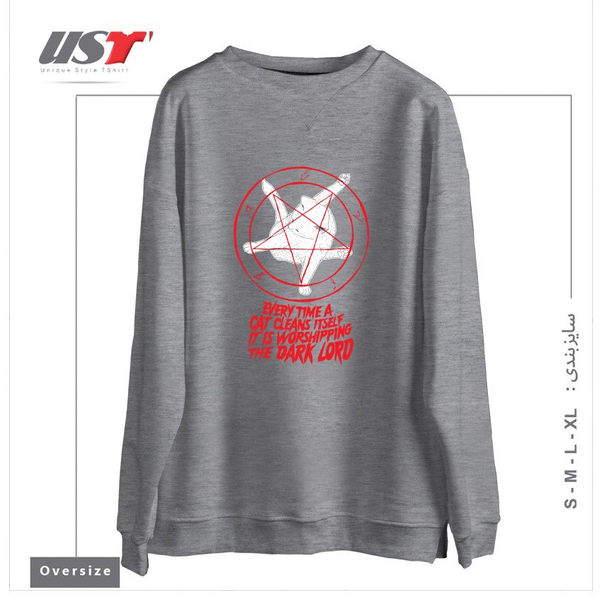 طرح EVERY TIME A CAT CLEANS ITSELF IT IS WORSHIPPING THE DARK LORD سوییشرت اورسایزرنگ طوسی ملانژ